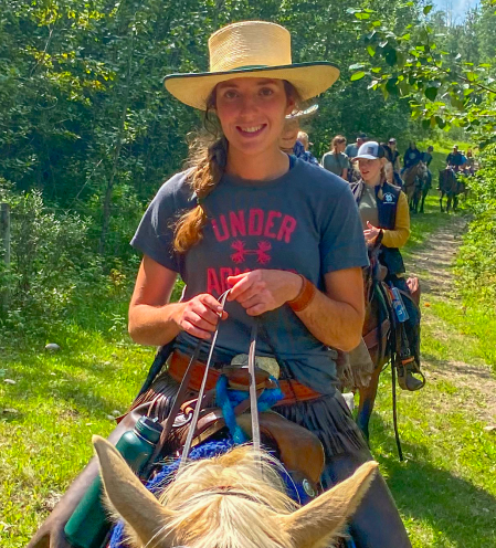 woman riding a horse